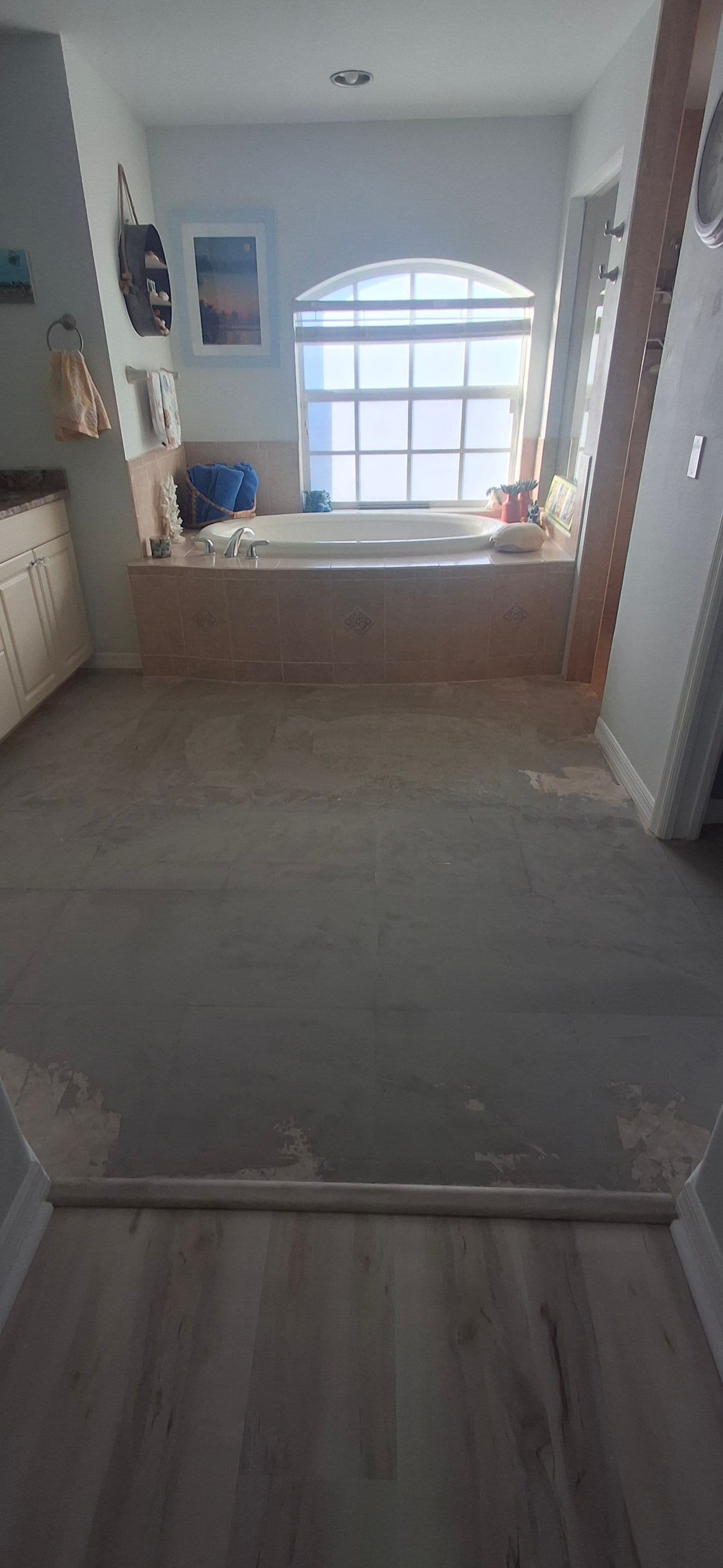 Modern Bathroom Floor Makeover with Vinyl Planks