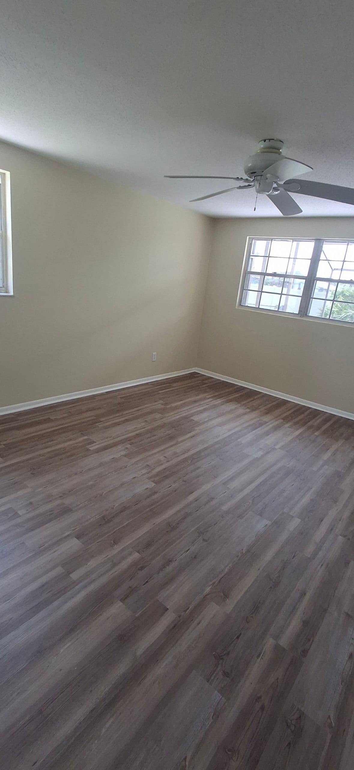 Sleek Vinyl Plank Flooring Transformation image