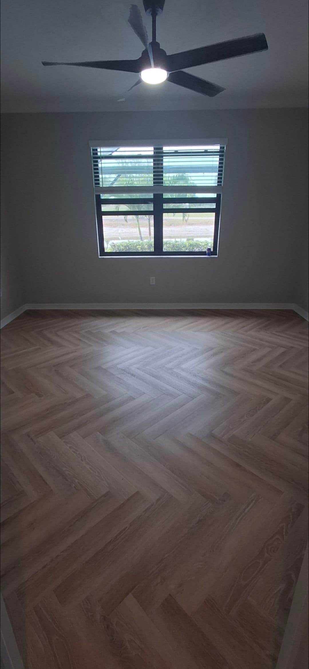 Elegant Herringbone Vinyl Plank Flooring Installation image
