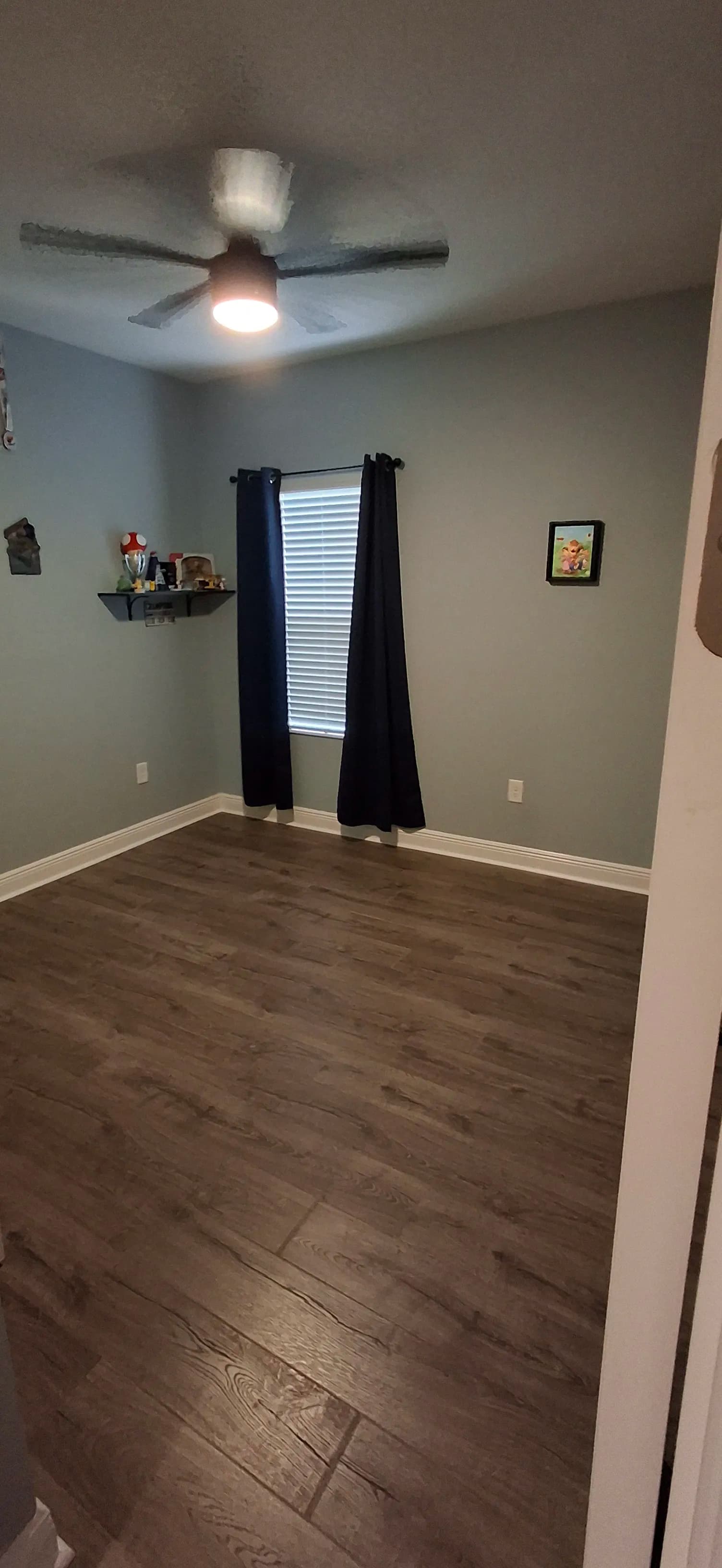 Bedroom Carpet Swapped Out for Low-Maintenance Laminate Flooring image